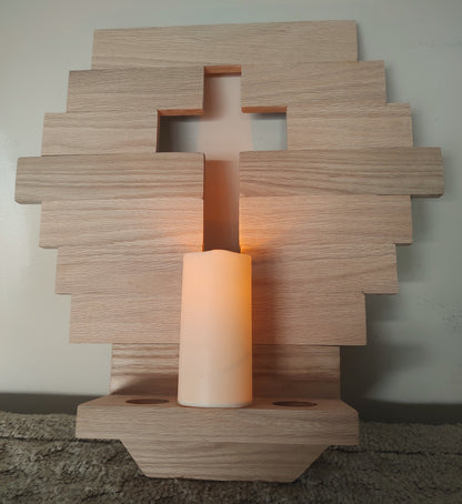 Handcrafted wooden cross with a three-candle holder, made from reclaimed oak. Perfect for rustic home décor, weddings, or as a meaningful gift.
